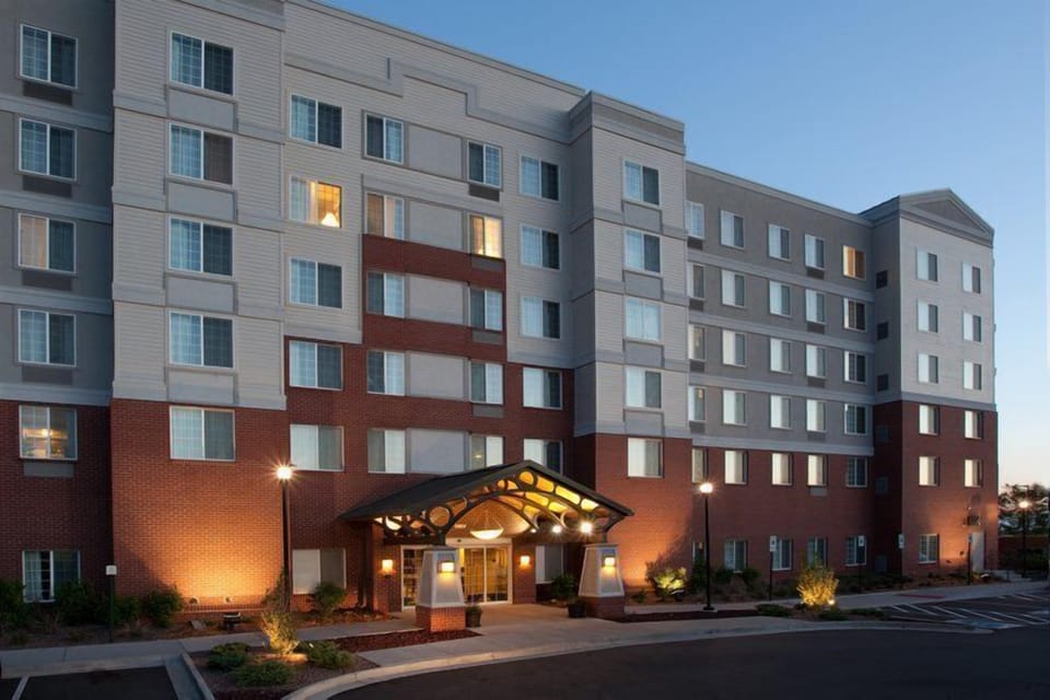 Extended-stay hotel exterior showing the full building structure.