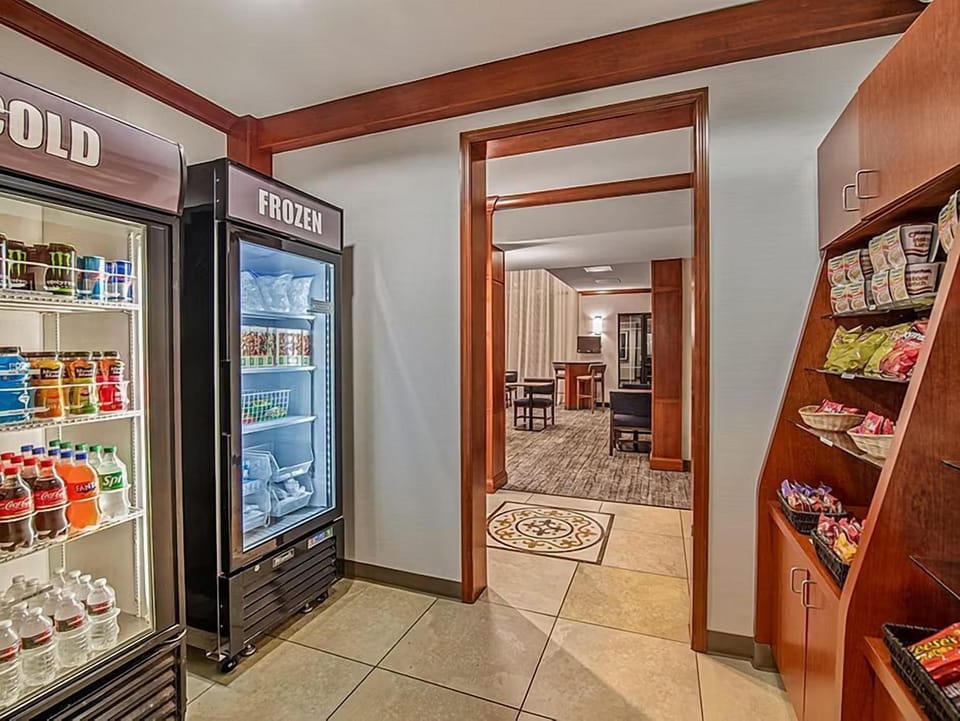 Find refreshments at your fingertips with snacks and chilled drinks awaiting you in this cozy corner.