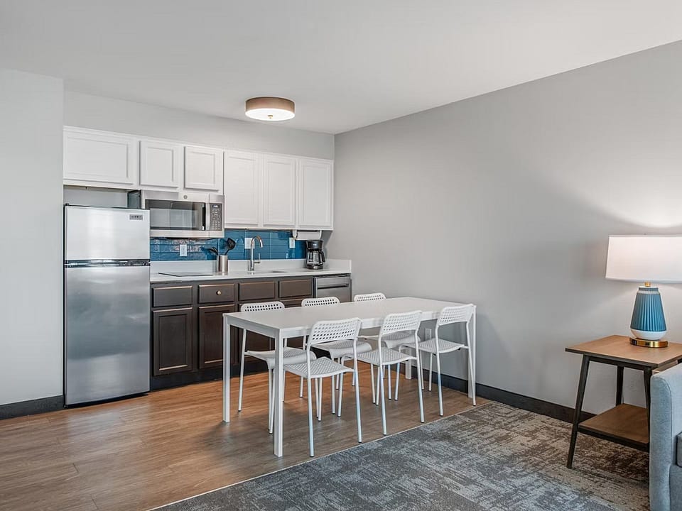 Cook up your favorite meals in a sleek, fully-equipped kitchen with a cozy dining area.