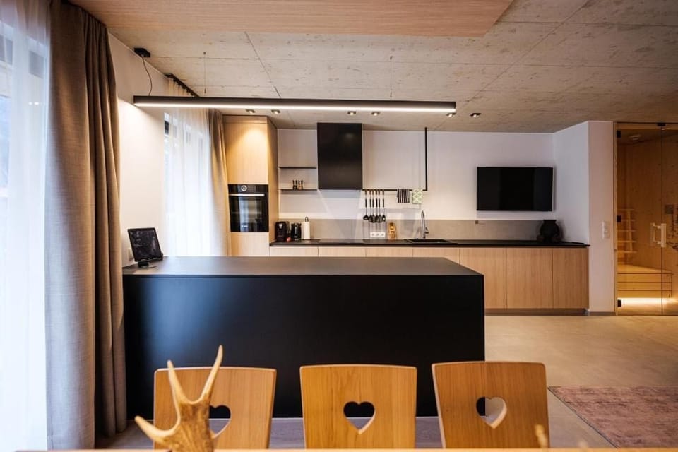 Deluxe Apartment, Balcony, Mountain View | Private kitchen | Highchair