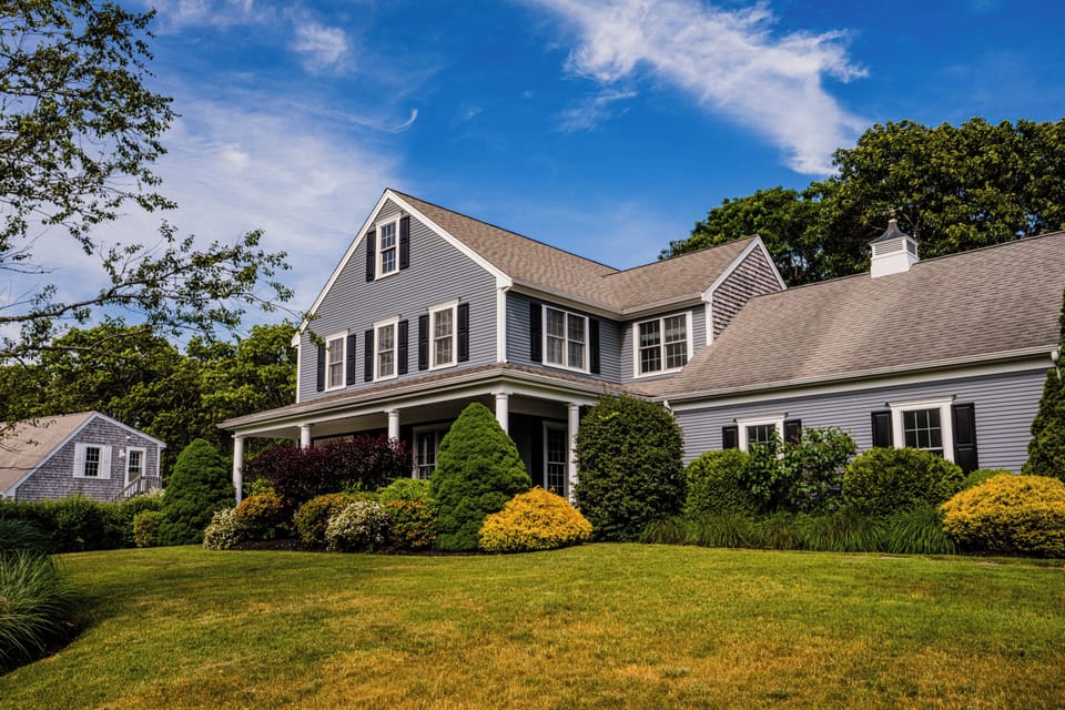 Classic Cape Cod curb appeal welcomes you to your coastal colonial escape