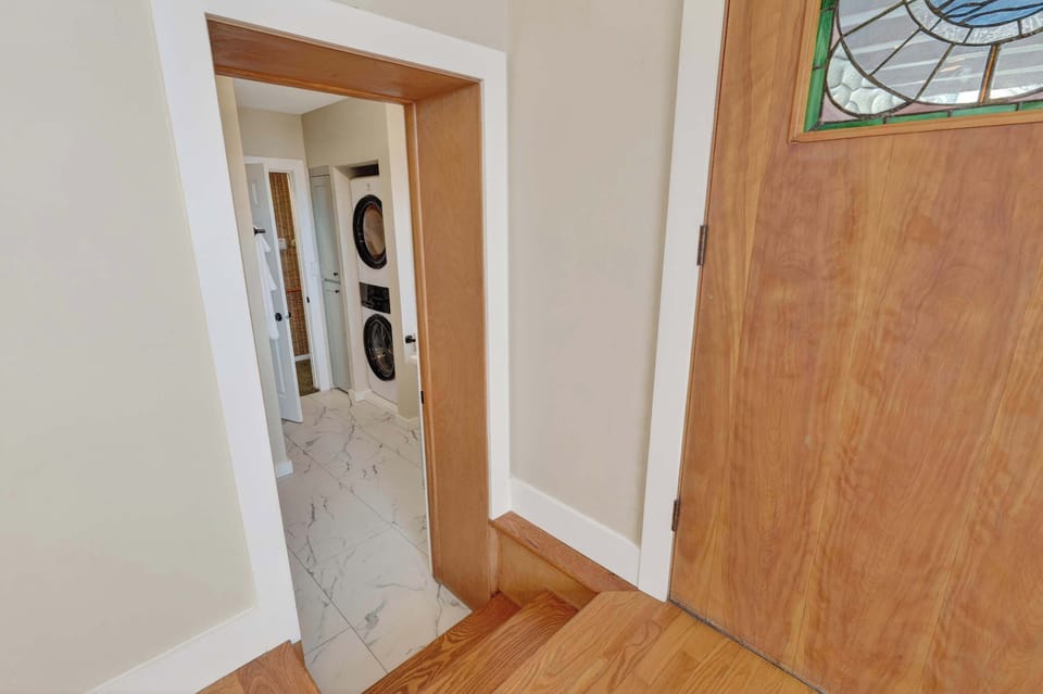 Make your way to the first Full bathroom on main floor. Includes Walk in shower, Sink, and Toilet. Also has the Washer and Dryer