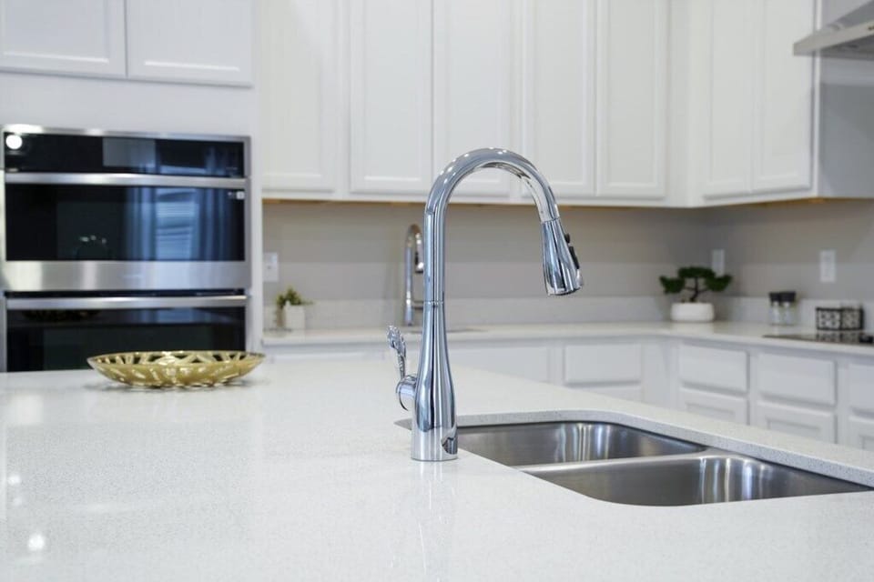 Modern kitchen sink with sleek finishes and ample counter space for easy meal prep
