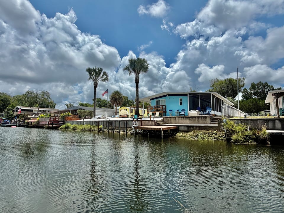 Backyard photo of this upriver cottage off a finger (5 min paddle to main river)