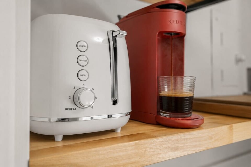 Enjoy a fresh cup of coffee anytime with the Keurig coffee maker and retro toaster, perfect for a quick, easy, and delicious start to your day.