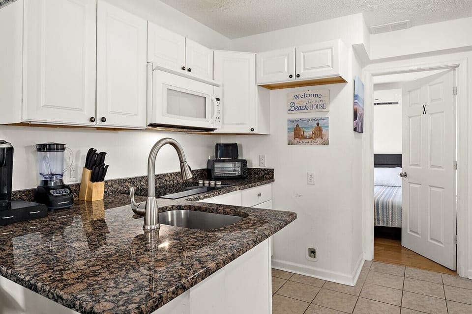 Fully equipped kitchen with everything needed for meals during your stay