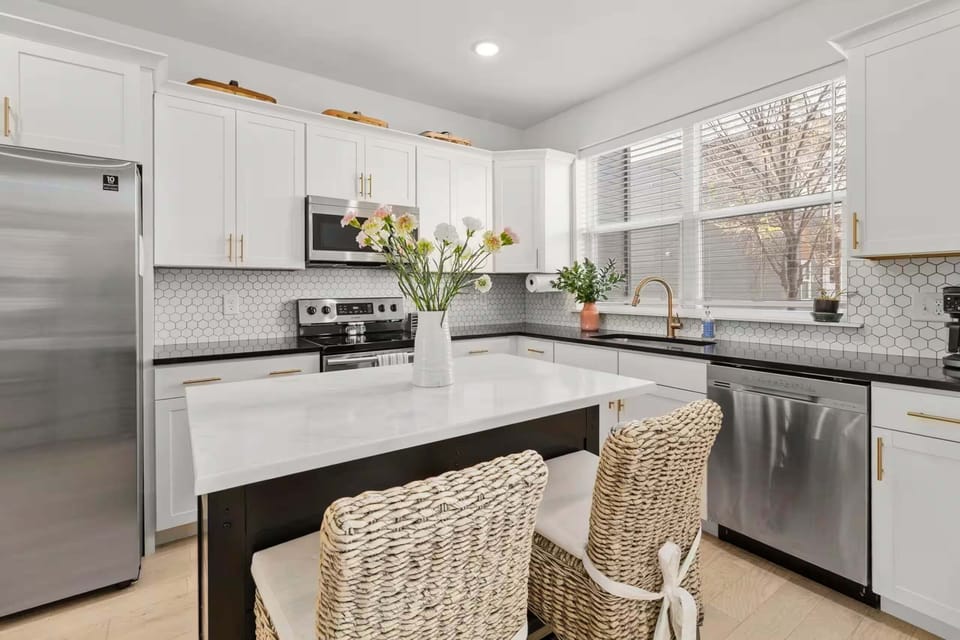Fully applianced kitchen with island and all the cooking essentials for your stay