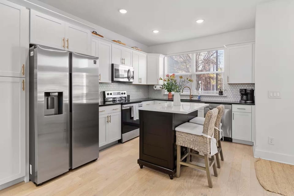 Fully applianced kitchen with island and all the cooking essentials for your stay
