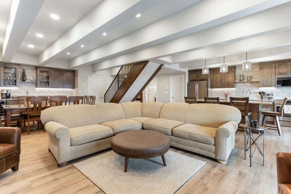 Living room featuring an indoor fireplace and smart TV