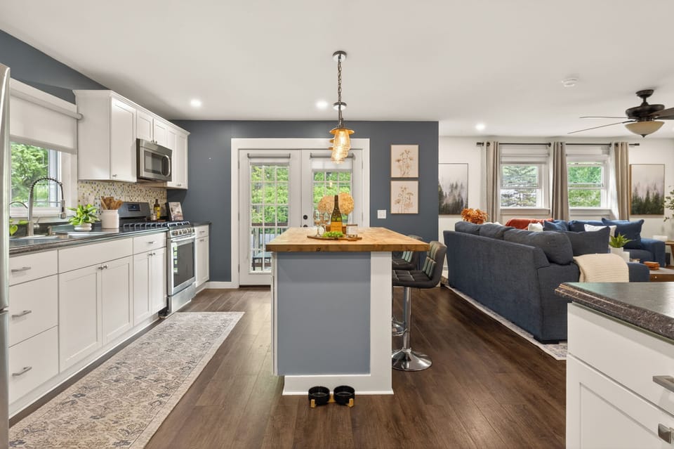 Kitchen island between cooking and living areas