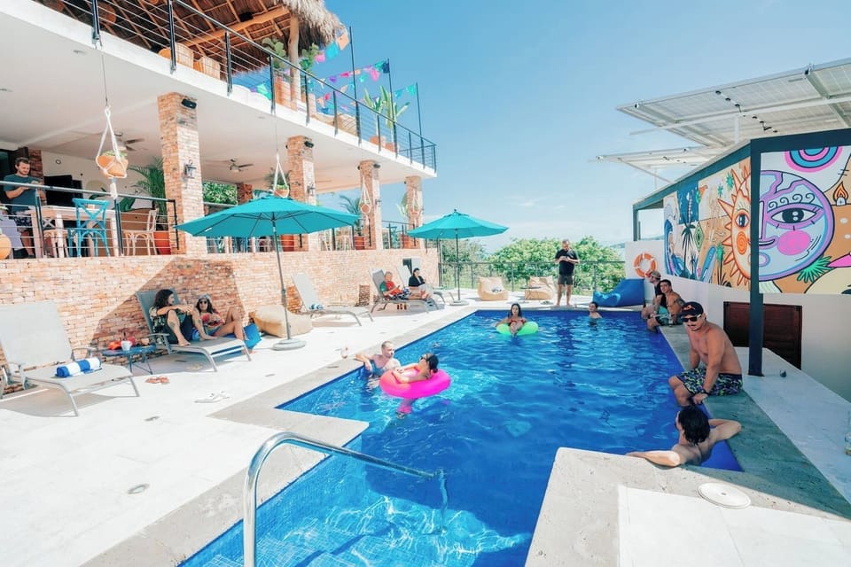 Shared rooftop pool with loungers and a nice well-priced restaurant (offsite) - FREE entrance, only order a drink or something from the menu