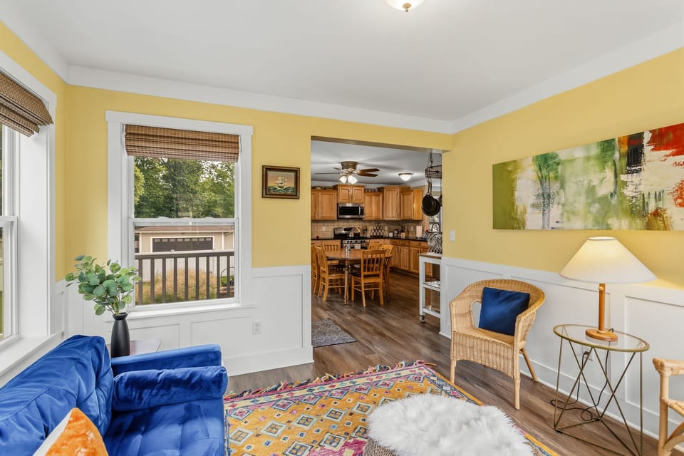 Stylish Sunroom Seating Connected to Main Level