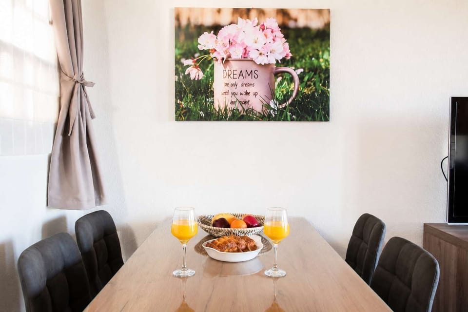 Gather around the dining table and enjoy meals with family or friends. Bright, welcoming, and thoughtfully designed, it’s the ideal setting for breakfast before heading out to explore