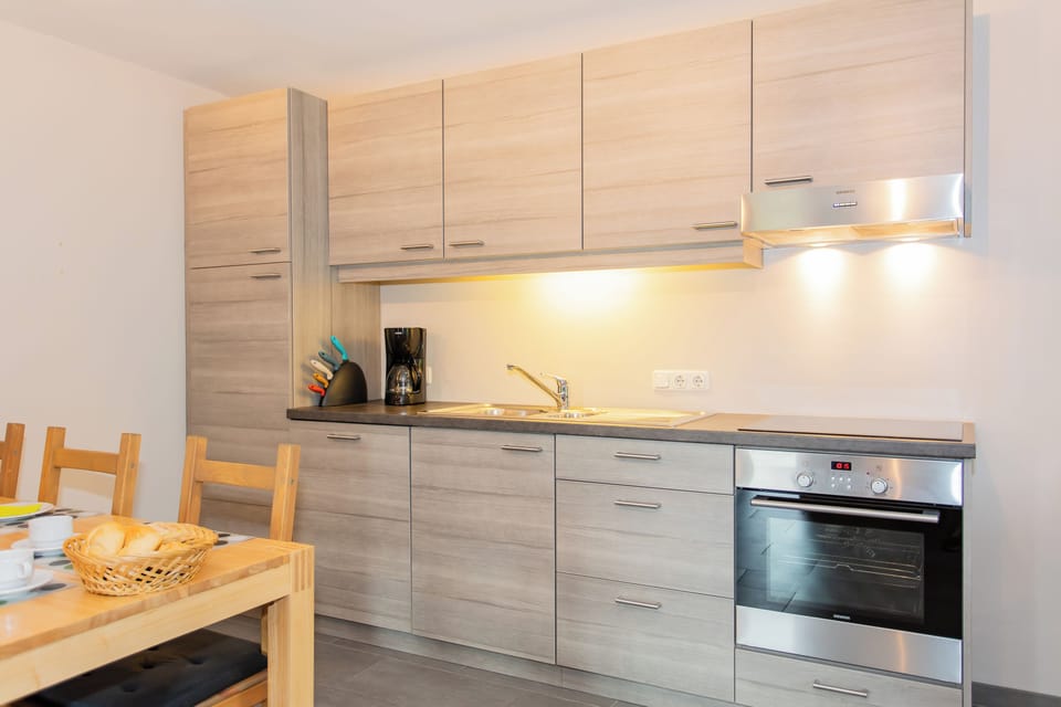 Family Condo, Balcony, Mountain View | Private kitchen | Fridge, microwave, oven, stovetop