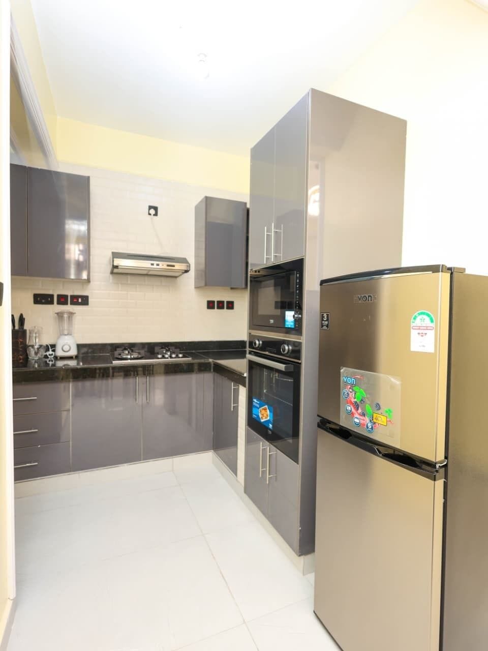 Classic Apartment, Balcony, City View | Private kitchen | Full-size fridge, microwave, oven, stovetop