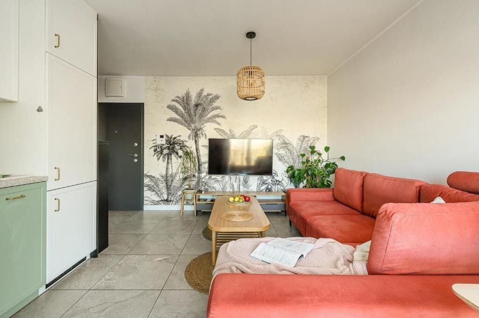 Luxury Apartment, Balcony, Courtyard View | Living room | Flat-screen TV
