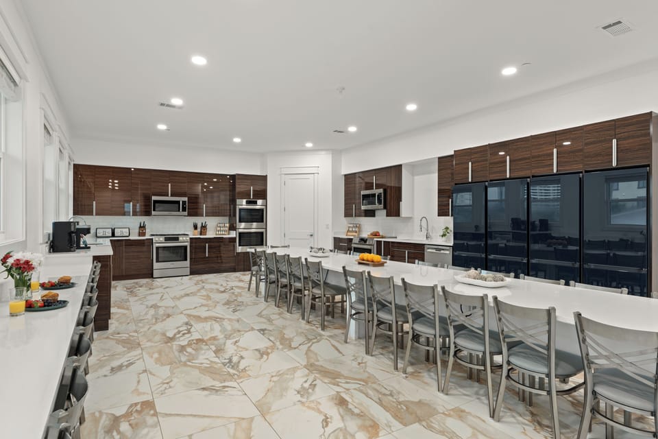 Gourmet kitchen equipped with expansive counter space and custom cabinetry.