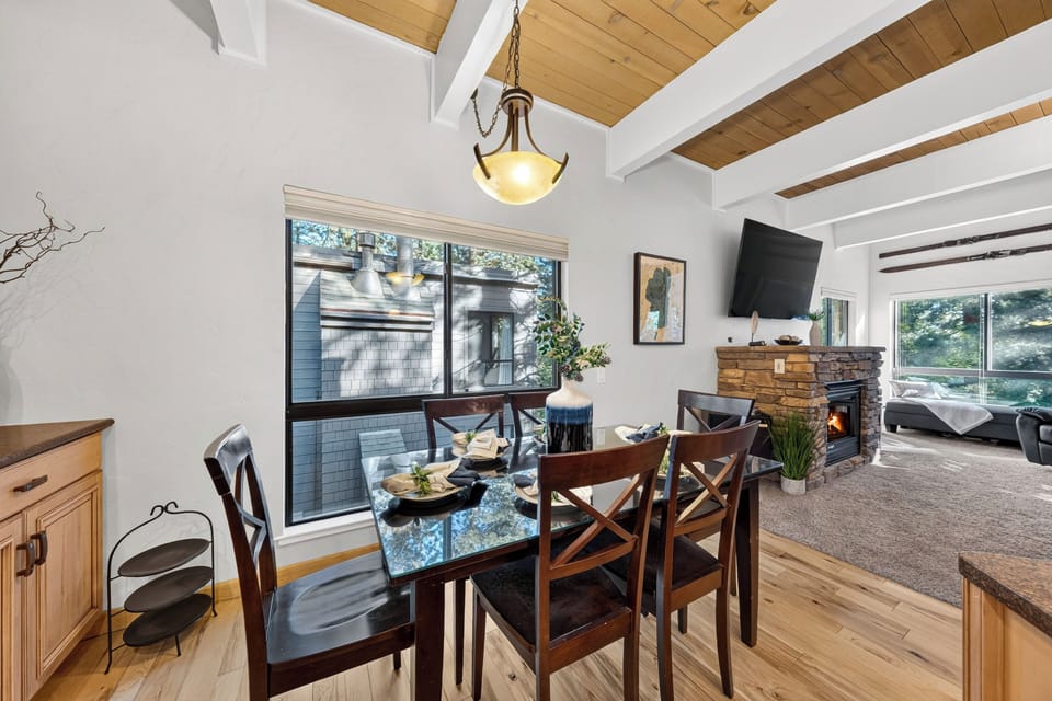 A view from the dining table showcases the open layout connecting the main dining and living areas.