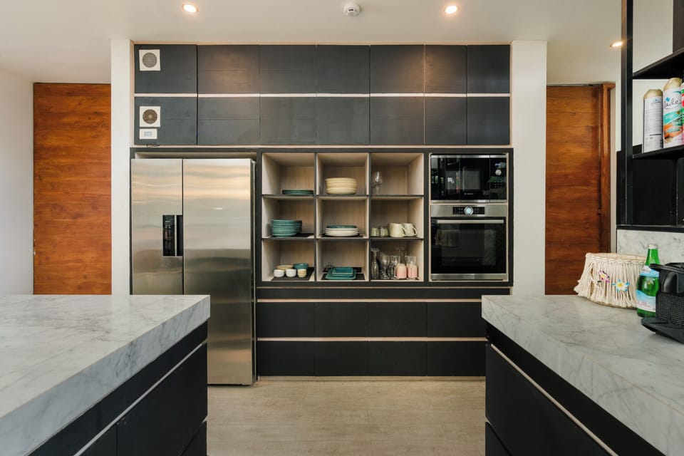 Luxury Villa | Private kitchen | Full-size fridge, microwave, oven, stovetop