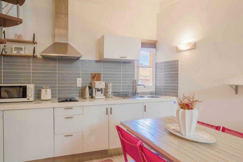 Apartment | Private kitchen | Coffee/tea maker, fridge, microwave, stovetop