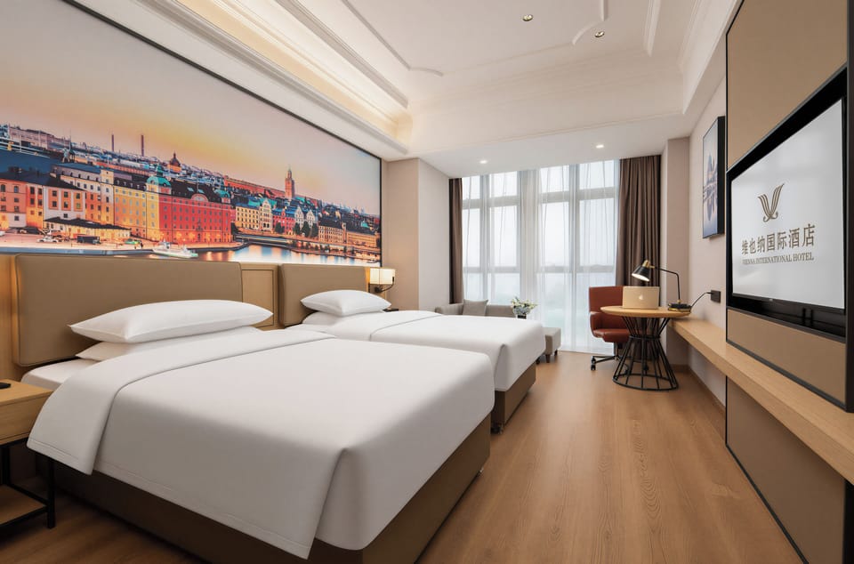 Luxury Twin Room, City View | Desk, laptop workspace, free WiFi