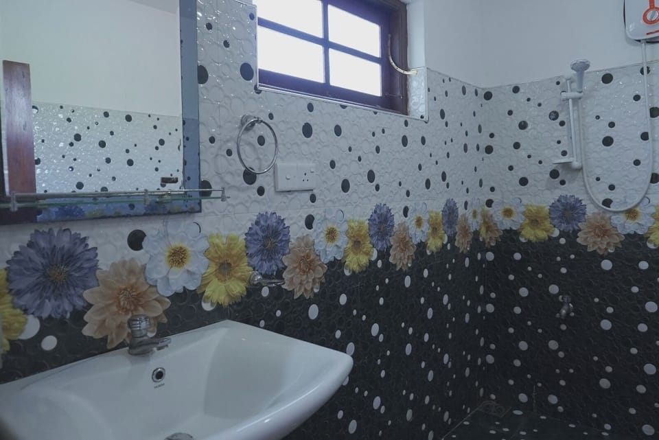 Family Room, Garden View | Bathroom | Shower, toilet paper
