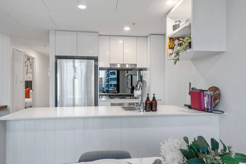 Full size fridge/freezer.  Oven, stove top and microwave.