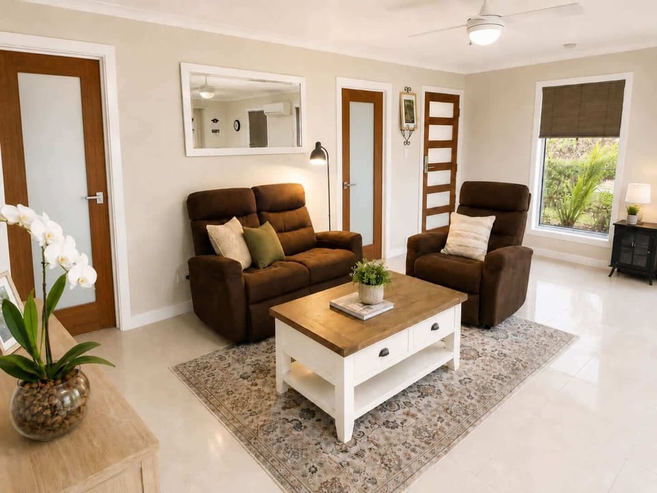 Bright, airy living with leafy views and room to unwind. with Smart TV and feet-up recliners.