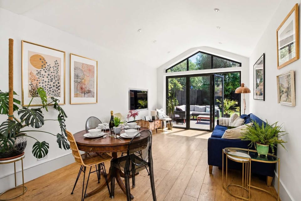 Dining Area: Savor memorable meals surrounded by plants, art, and leafy garden views!