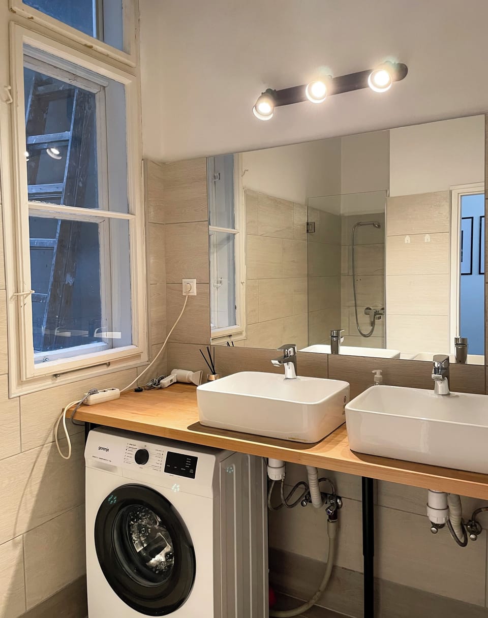 Separate tub and shower, hair dryer, towels, soap