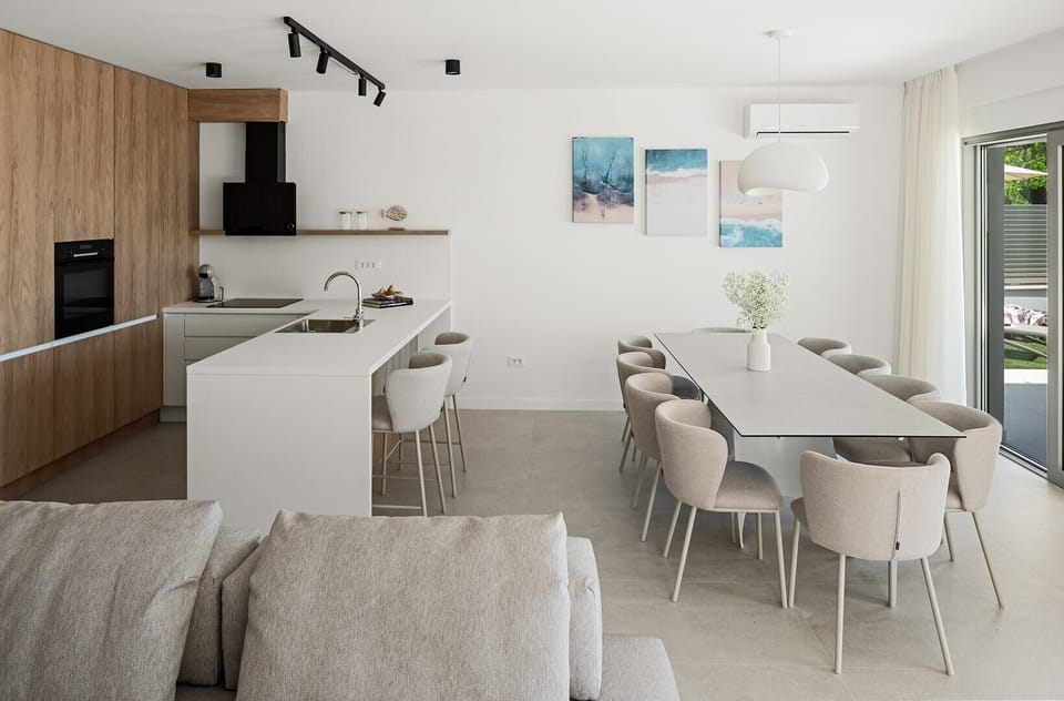 Fully equipped kitchen features a large central kitchen island.