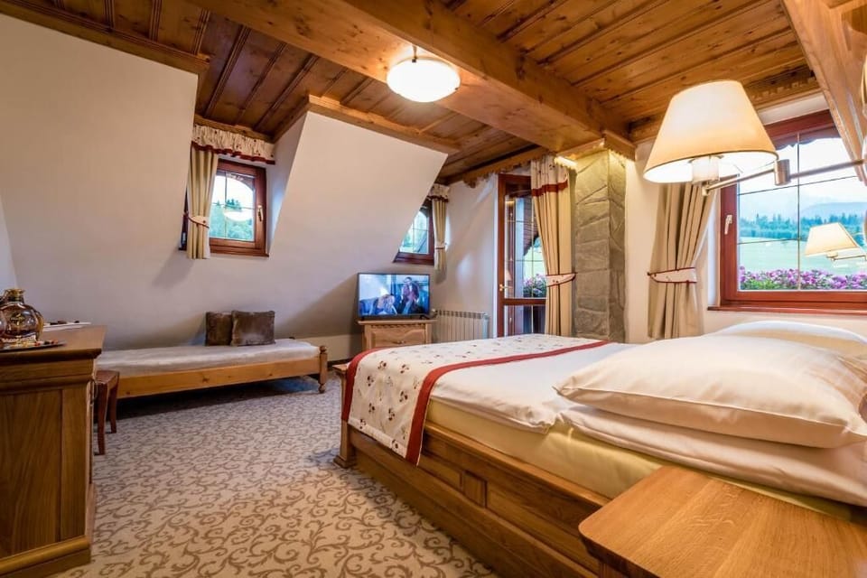 Quadruple Room, Balcony, Mountain View | In-room safe, desk, laptop workspace, blackout drapes