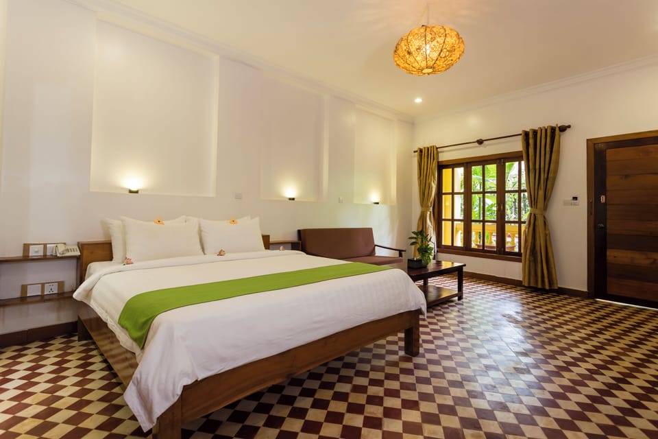 Deluxe Double Room, Pool View | Minibar, in-room safe, desk, free WiFi