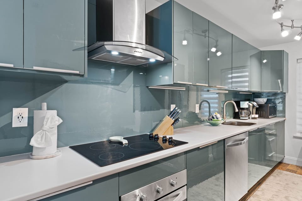 Modern & Sleek Kitchen w/ all the comforts of home for the family chef to enjoy