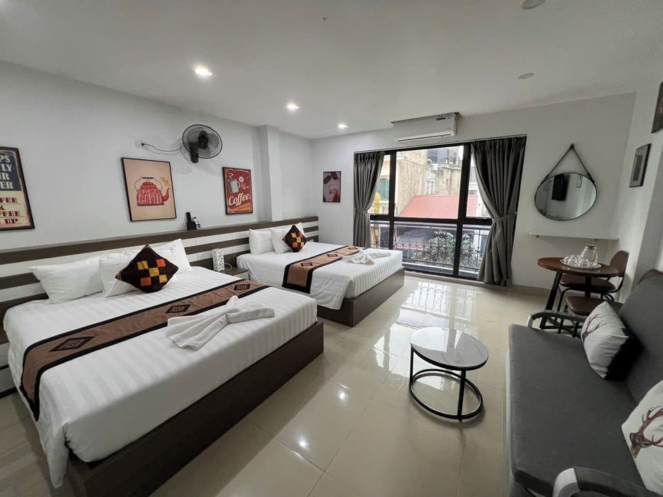 Deluxe Quadruple Room, City View | Premium bedding, desk, WiFi (free)