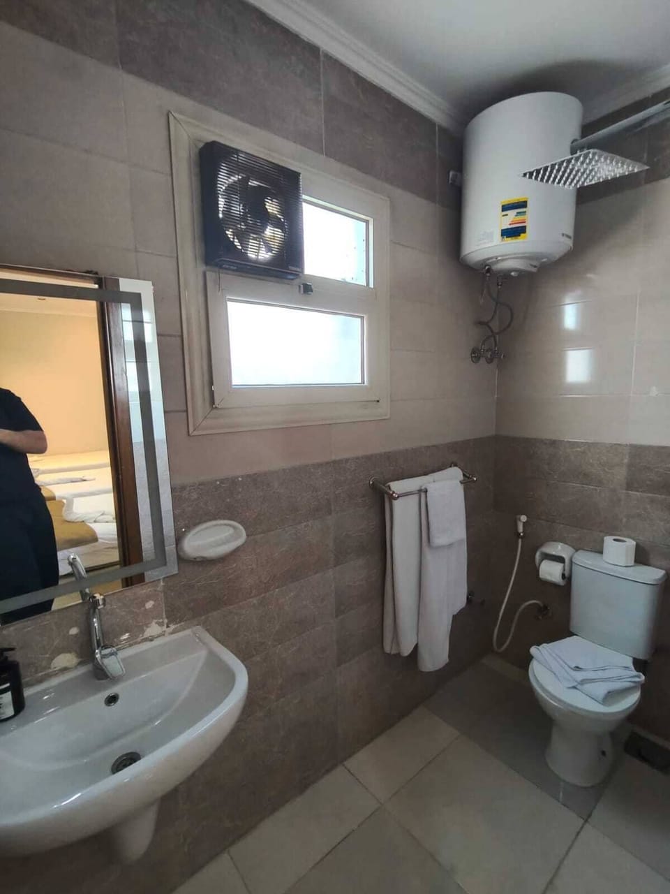 Combined shower/tub, hair dryer, towels, soap