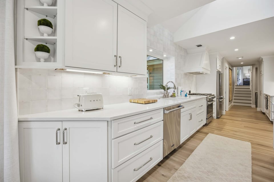 Modern home with an open-concept living area and a spacious kitchen with a large central island.