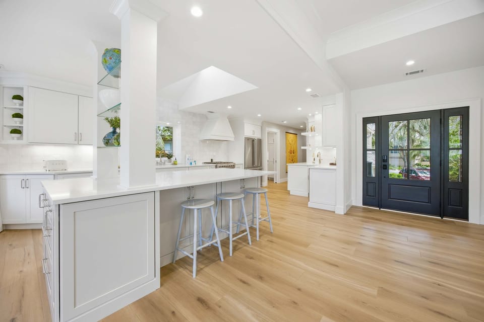 Modern home with an open-concept living area and a spacious kitchen with a large central island.