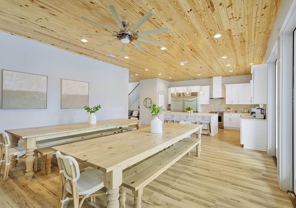 1st Floor - Gather around two oversized 11-foot dining tables with seating for your entire group. The perfect place to enjoy family meals, celebrate special occasions, and create unforgettable memories together.