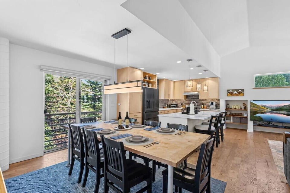 Open concept living space with walkout patio