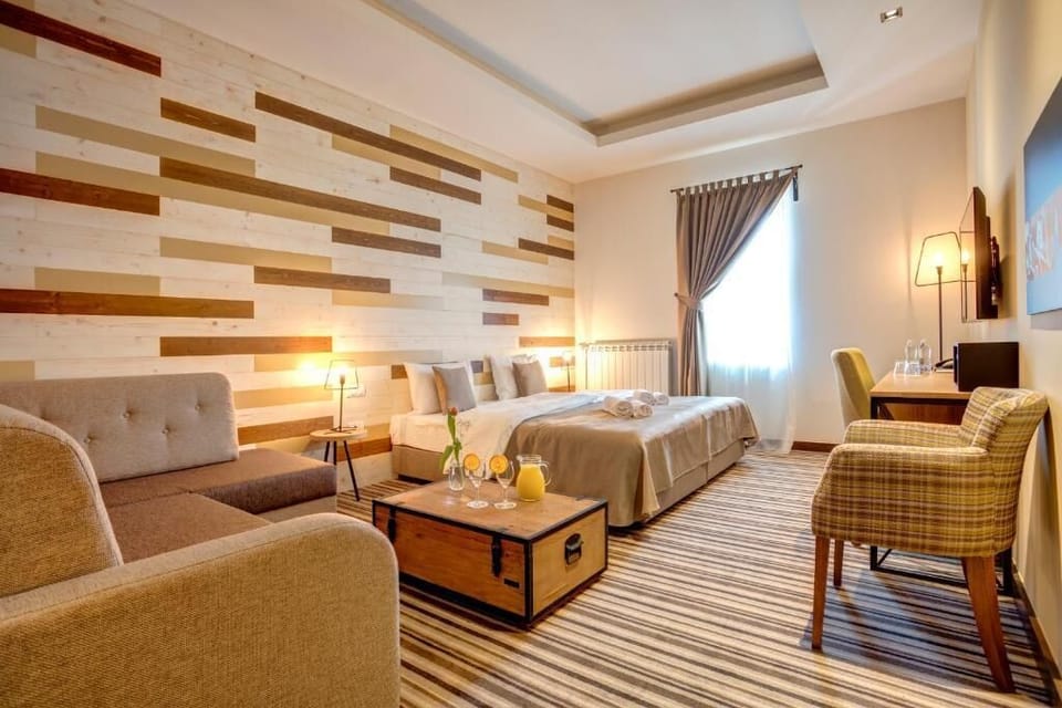 Superior Quadruple Room | In-room safe, desk, blackout drapes, soundproofing