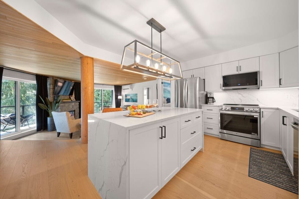 Beautifully renovated kitchen with a huge island, modern appliances and plenty of prep space