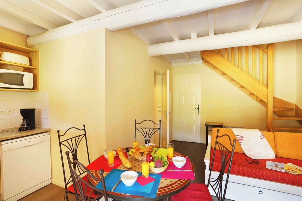 Natural light fills the living space, creating a warm and inviting atmosphere throughout your stay on this 6-hectare estate.