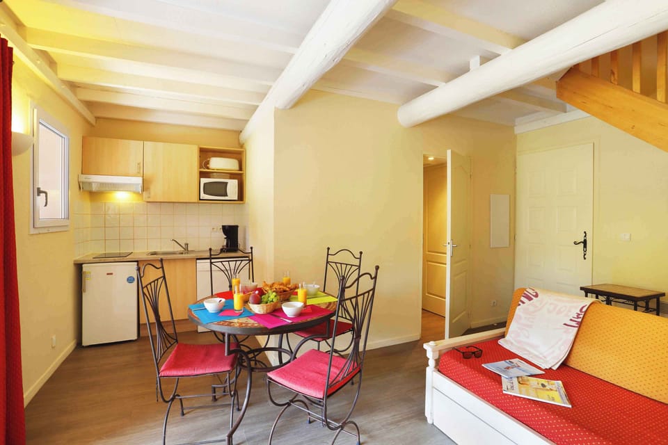 The fully equipped kitchen keeps meal preparation simple, with all the essentials on hand for a group of up to eight.