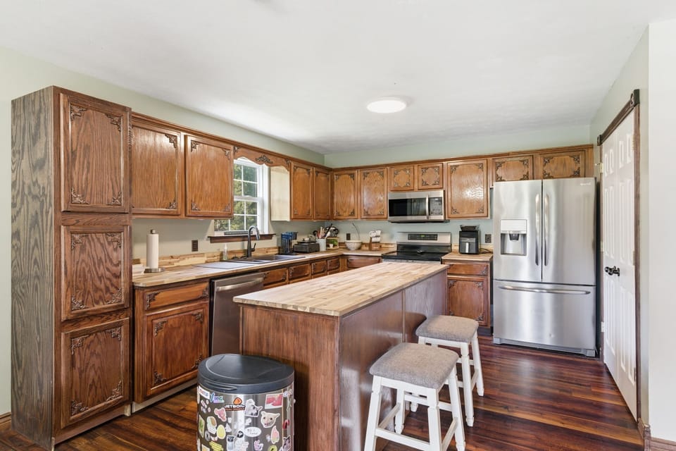 Stunning wood cabinetry and ample counter space in the kitchen.