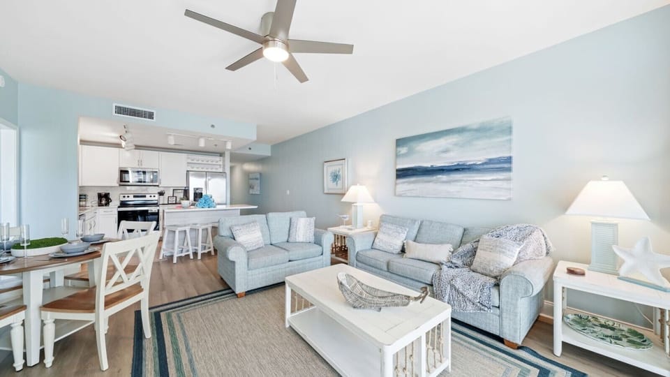 Open Concept Living Area with Ocean Views, Flat Screen TV, Sleeper Sofa and Dining Table
