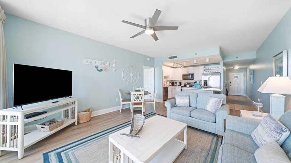 Open Concept Living Area with Ocean Views, Flat Screen TV, Sleeper Sofa and Dining Table