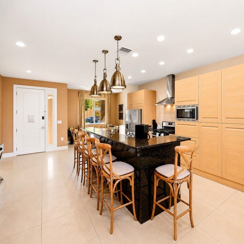 Elevated finishes and open sightlines make this kitchen the heart of the home