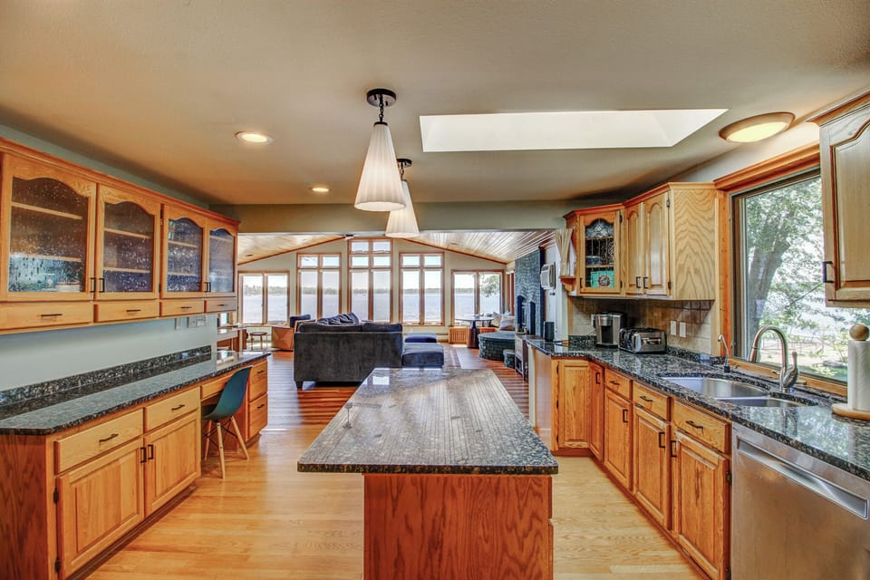 A fully equipped kitchen opens straight into the great room, so no one's left out of the conversation (or the view).