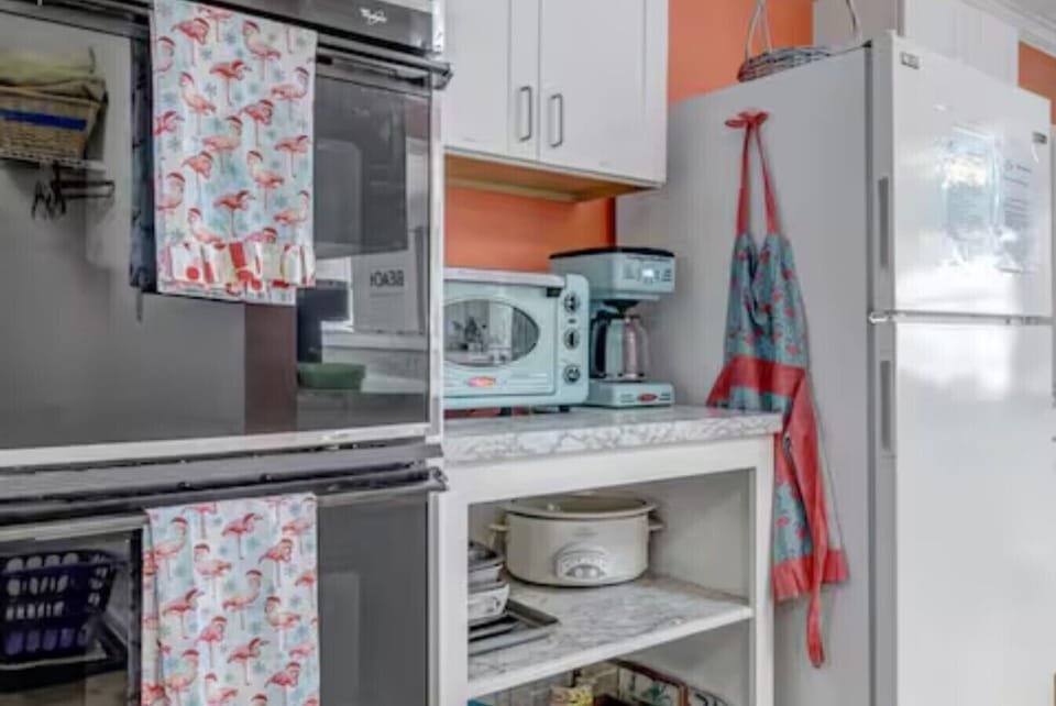 161 Surfside Canva  kitchen oven and fridge